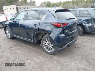 2020 Mazda CX-5 Grand Touring with VIN JM3KFBDM7L1723852, listed as a IAAI auction lot 41848152 with 85,099 mi miles. Bid and sale history available at carsss.com. Image 3.