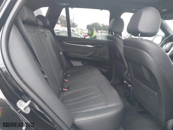 2018 BMW X5 xDrive40e iPerformance with VIN 5UXKT0C54J0V99573, listed as a IAAI auction lot 41490567 with 50,650 mi miles. Bid and sale history available at carsss.com. Image 8.