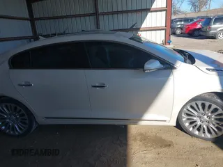 2014 Buick LaCrosse Premium II with VIN 1G4GF5G31EF166411, listed as a IAAI auction lot 41240048 with 82,231 mi miles and . Bid and sale history available at DreamBid. Image 14.