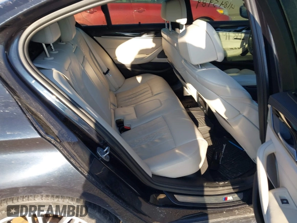 2018 BMW 5 Series M550i xDrive with VIN WBAJB9C59JG463948, listed as a IAAI auction lot 41845989 with 99,385 mi miles. Bid and sale history available at carsss.com. Image 8.