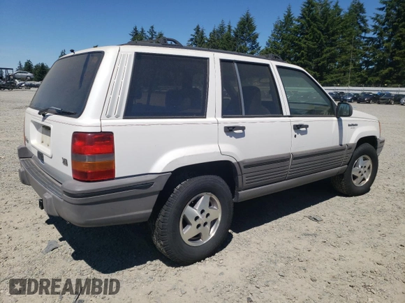 1994 Jeep Grand Cherokee Laredo with VIN 1J4GZ58Y7RC113333, listed as a Copart auction lot 57995734 with 220,950 mi miles and Clean Title. Bid and sale history available at carsss.com. Image 3.