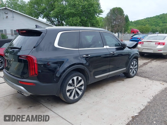 2022 Kia Telluride S with VIN 5XYP64HC6NG261279, listed as a IAAI auction lot 42240640 with 89,317 mi miles and . Bid and sale history available at DreamBid. Image 4.