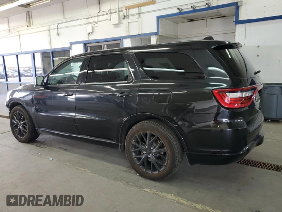 2015 Dodge Durango R/T with VIN 1C4SDJCTXFC817802, listed as a Copart auction lot 61962865 with 146,826 mi miles and Salvage title. Bid and sale history available at DreamBid. Image 2.