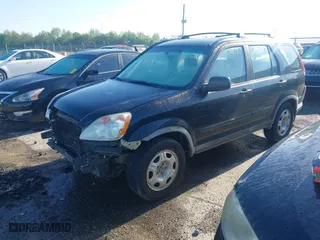 2005 Honda CR-V LX with VIN JHLRD68555C014550, listed as a IAAI auction lot 41986080 with 263,617 mi miles. Bid and sale history available at carsss.com. Image 2.