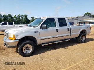 1999 Ford F-350 XL with VIN 1FTSW31S2XEE89071, listed as a Copart auction lot 61016685 with 115,130 mi miles and Salvage title. Bid and sale history available at DreamBid. Image 1.