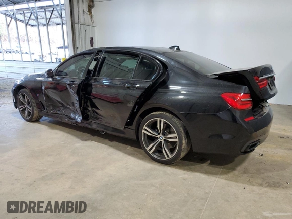 2016 BMW 7 Series 750i with VIN WBA7F0C5XGGL99017, listed as a Copart auction lot 84934504 with 0 mi miles and Salvage Title. Bid and sale history available at carsss.com. Image 2.