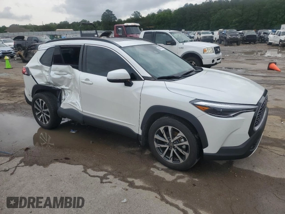 2023 Toyota Corolla Cross XLE with VIN 7MUDAABG3PV044005, listed as a Copart auction lot 54955225 with 50,712 mi miles and Salvage title. Bid and sale history available at DreamBid. Image 4.
