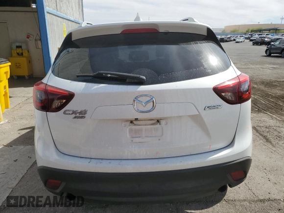 2016 Mazda CX-5 Grand Touring with VIN JM3KE4DY9G0662369, listed as a Copart auction lot 53169895 with 160,784 mi miles and Salvage Title. Bid and sale history available at carsss.com. Image 6.