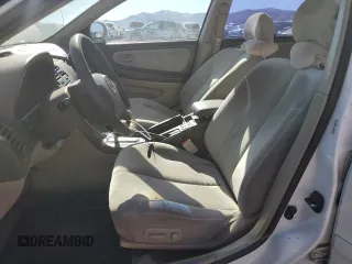 2001 Nissan Maxima GXE z VIN JN1CA31D61T818364, wystawiony jako Copart lot #67593624 z przebiegiem 158 601 mil mil oraz Szkoda całkowita • Salvage title. Historia ofert i sprzedaży dostępna na DreamBid. Obrazek 7.