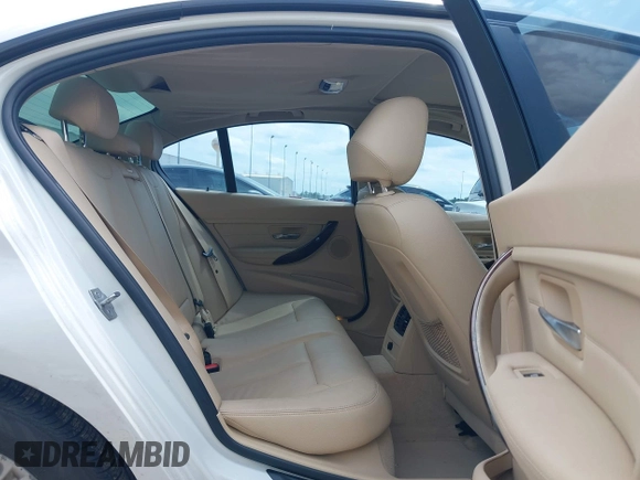 2013 BMW 3 Series 328i with VIN WBA3A5C5XDJ461783, listed as a IAAI auction lot 42150355 with 115,992 mi miles and . Bid and sale history available at DreamBid. Image 8.