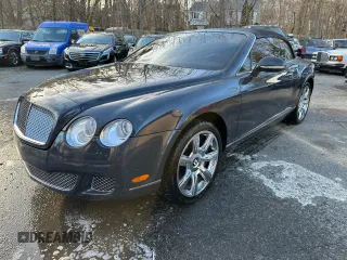 2010 Bentley Continental GT with VIN SCBDR3ZA9AC066604, listed as a Copart auction lot 86160224 with 59,156 mi miles and Salvage Title. Bid and sale history available at DreamBid. Image 2.