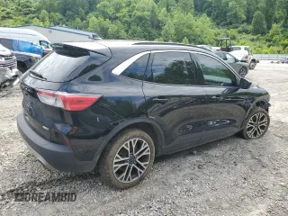 2020 Ford Escape SEL with VIN 1FMCU9H68LUB17865, listed as a Copart auction lot 58217685 with 113,569 mi miles and Salvage title. Bid and sale history available at DreamBid. Image 3.