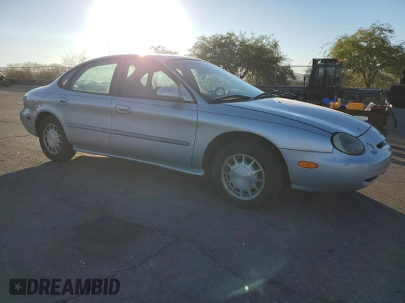 1996 Ford Taurus LX with VIN 1FALP53S9TG173438, listed as a Copart auction lot 77232114 with 89,789 mi miles and Clean title. Bid and sale history available at DreamBid. Image 4.