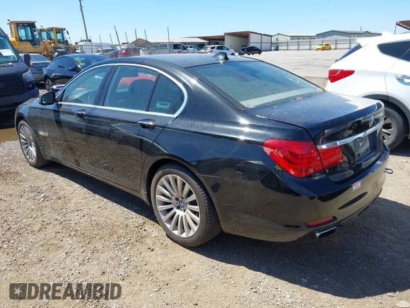 2012 BMW 7 Series 750i with VIN WBAKA8C50CCY37892, listed as a IAAI auction lot 42080313 with 148,058 mi miles. Bid and sale history available at carsss.com. Image 3.