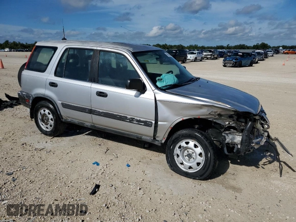 2000 Honda CR-V LX with VIN JHLRD2841YC010239, listed as a Copart auction lot 69995684 with 188,885 mi miles and Salvage Title. Bid and sale history available at carsss.com. Image 4.