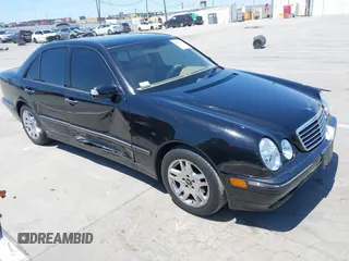 2002 Mercedes-Benz E-Class with VIN WDBJF65J62B404868, listed as a IAAI auction lot 42121837 with 107,415 mi miles. Bid and sale history available at carsss.com. Image 1.