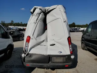 2021 Ford Transit Cargo with VIN 1FTBW3X83MKA40734, listed as a Copart auction lot 77427214 with Not Provided miles and Salvage Title. Bid and sale history available at carsss.com. Image 6.