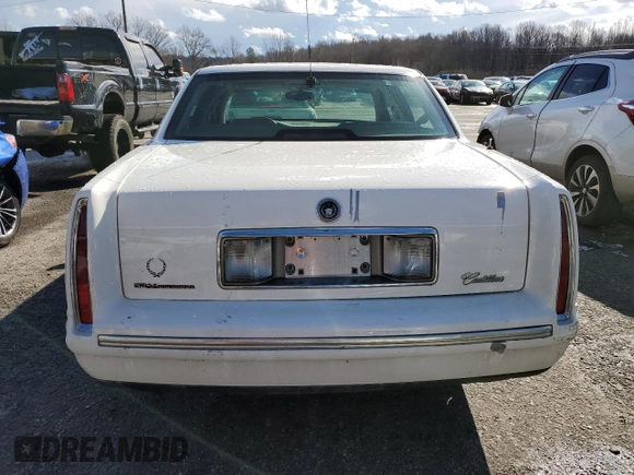 1998 Cadillac DeVille with VIN 1G6KD54Y6WU702886, listed as a Copart auction lot 42737665 with 106,454 mi miles and Salvage Title. Bid and sale history available at carsss.com. Image 6.