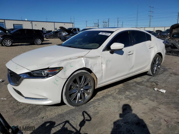 2021 Mazda Mazda6 Signature with VIN JM1GL1XY6M1614767, listed as a Copart auction lot 78573824 with 47,661 mi miles and Salvage Title. Bid and sale history available at carsss.com. Image 1.