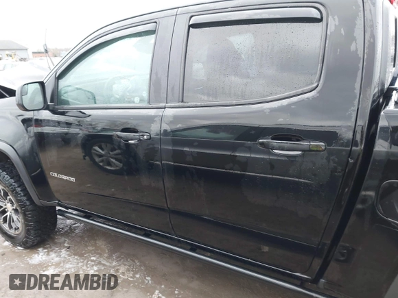 2018 Chevrolet Colorado 4WD ZR2 with VIN 1GCGTEEN9J1173647, listed as a IAAI auction lot 42016015 with 102,041 mi miles. Bid and sale history available at carsss.com. Image 15.
