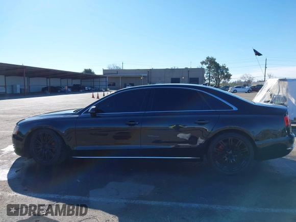 2011 Audi A8 z VIN WAURVAFD6BN019339, wystawiony jako IAAI lot #41560306 z przebiegiem 123 726 mil mil oraz . Historia ofert i sprzedaży dostępna na DreamBid. Obrazek 14.