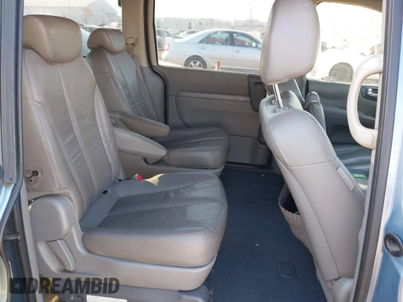 2010 Kia Sedona EX with VIN KNDMH4C38A6334878, listed as a IAAI auction lot 41772024 with 208,818 mi miles. Bid and sale history available at carsss.com. Image 8.