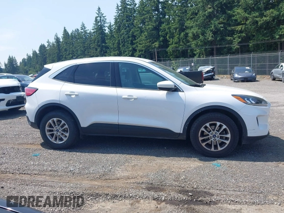 2020 Ford Escape SE with VIN 1FMCU9G67LUA79806, listed as a IAAI auction lot 42560963 with 103,070 mi miles and . Bid and sale history available at DreamBid. Image 13.