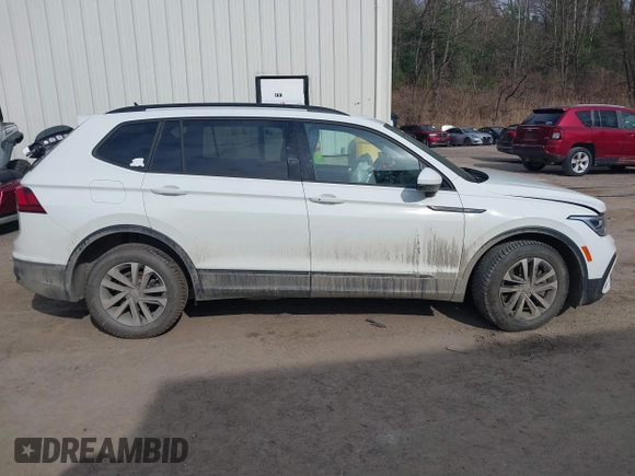 2022 Volkswagen Tiguan S z VIN 3VV0B7AX2NM097402, wystawiony jako IAAI lot #41845707 z przebiegiem 38 668 mil mil oraz . Historia ofert i sprzedaży dostępna na DreamBid. Obrazek 13.