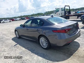 2023 Alfa Romeo Giulia with VIN ZARFAMAN0P7670423, listed as a IAAI auction lot 42842712 with 54,512 mi miles and . Bid and sale history available at DreamBid. Image 3.