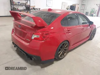 2015 Subaru WRX Premium with VIN JF1VA1D66F8804732, listed as a IAAI auction lot 41558676 with 142,471 mi miles. Bid and sale history available at carsss.com. Image 4.