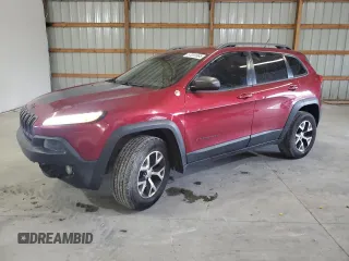 2014 Jeep Cherokee Trailhawk z VIN 1C4PJMBB3EW160508, wystawiony jako Copart lot #57051565 z przebiegiem 218 085 mil mil oraz Szkody całkowita. Historia ofert i sprzedaży dostępna na DreamBid. Obrazek 1.