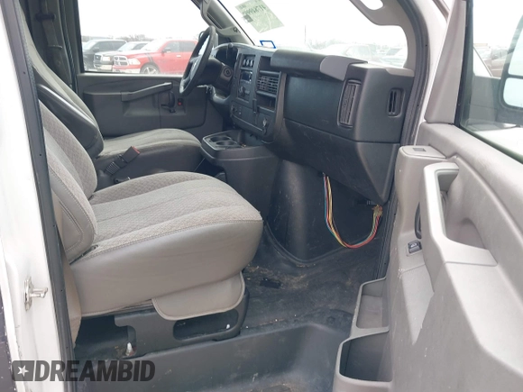 2017 Chevrolet Express Cargo Van with VIN 1GCWGBFFXH1139037, listed as a IAAI auction lot 41784999 with 198,660 mi miles. Bid and sale history available at carsss.com. Image 5.