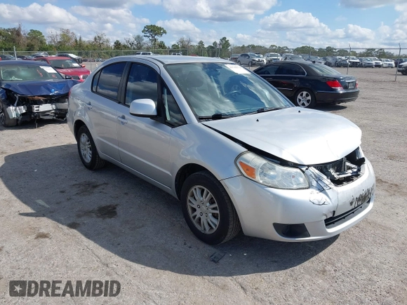 2012 Suzuki SX4 LE with VIN JS2YC5A30C6304324, listed as a IAAI auction lot 41585174 with 111,471 mi miles. Bid and sale history available at carsss.com. Image 1.