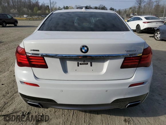 2015 BMW 7 Series 750i xDrive с VIN WBAYB6C50FD225492, выставлен на аукционе Copart как лот 50018225 с пробегом 76 059 миль миль и Списание • Salvage title. История ставок и продаж доступна на DreamBid. Изображение 6.