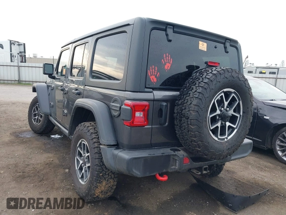 2024 Jeep Wrangler Rubicon with VIN 1C4PJXFG1RW314131, listed as a IAAI auction lot 41472426 with Not provided miles and . Bid and sale history available at DreamBid. Image 3.