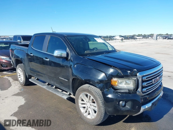 2016 GMC Canyon 2WD SLT with VIN 1GTG5DE35G1184141, listed as a IAAI auction lot 40875490 with 126,747 mi miles. Bid and sale history available at carsss.com. Image 1.