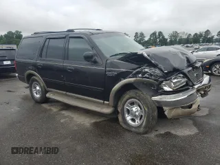 2002 Ford Expedition Eddie Bauer with VIN 1FMPU18LX2LA39571, listed as a Copart auction lot 58774915 with 388,886 mi miles and Salvage title. Bid and sale history available at DreamBid. Image 4.
