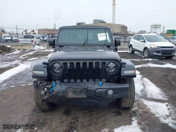 2022 Jeep Wrangler 4xe Unlimited Sahara with VIN 1C4JJXP66NW101035, listed as a IAAI auction lot 41528135 with 17,943 mi miles. Bid and sale history available at carsss.com. Image 12.
