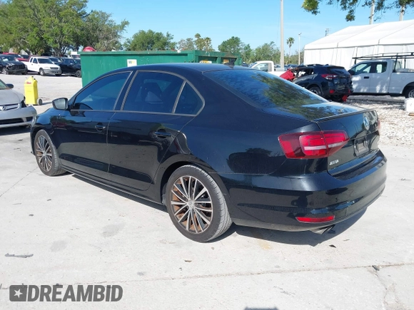 2016 Volkswagen Jetta Sport z VIN 3VWD17AJ9GM412257, wystawiony jako IAAI lot #41880133 z przebiegiem 119 692 mil mil oraz . Historia ofert i sprzedaży dostępna na DreamBid. Obrazek 3.