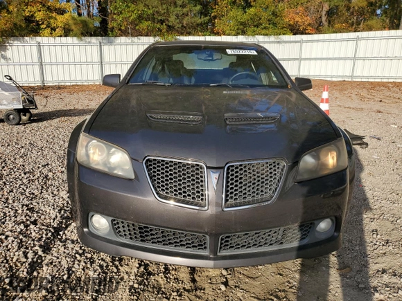 2008 Pontiac G8 z VIN 6G2ER57778L128068, wystawiony jako Copart lot #78922214 z przebiegiem 100 355 mil mil oraz Czysty tytuł • Clean title. Historia ofert i sprzedaży dostępna na DreamBid. Obrazek 5.