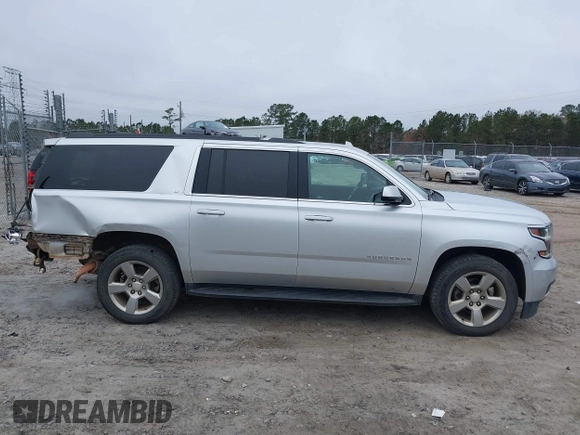2018 Chevrolet Suburban LT z VIN 1GNSCHKC1JR394991, wystawiony jako IAAI lot #41192222 z przebiegiem 90 313 mil mil oraz . Historia ofert i sprzedaży dostępna na DreamBid. Obrazek 14.