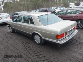 1987 Mercedes-Benz 560 with VIN WDBCA39D5HA357048, listed as a IAAI auction lot 41672343 with 151,635 mi miles and . Bid and sale history available at DreamBid. Image 3.