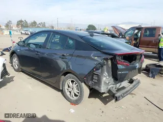 2021 Toyota Prius Prime LE with VIN JTDKAMFP9M3171321, listed as a IAAI auction lot 41464622 with NaN miles. Bid and sale history available at carsss.com. Image 3.