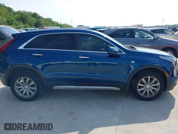 2019 Cadillac XT4 FWD Premium Luxury с VIN 1GYFZCR44KF144295, выставлен на аукционе IAAI как лот 42273524 с пробегом 68 736 миль миль и . История ставок и продаж доступна на DreamBid. Изображение 13.