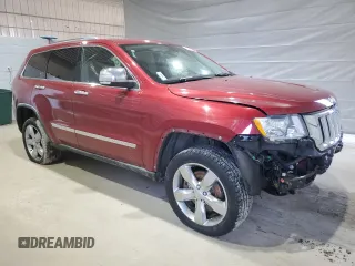 2012 Jeep Grand Cherokee Overland with VIN 1C4RJFCT8CC171384, listed as a Copart auction lot 48164355 with 213,848 mi miles and Salvage Title. Bid and sale history available at carsss.com. Image 4.