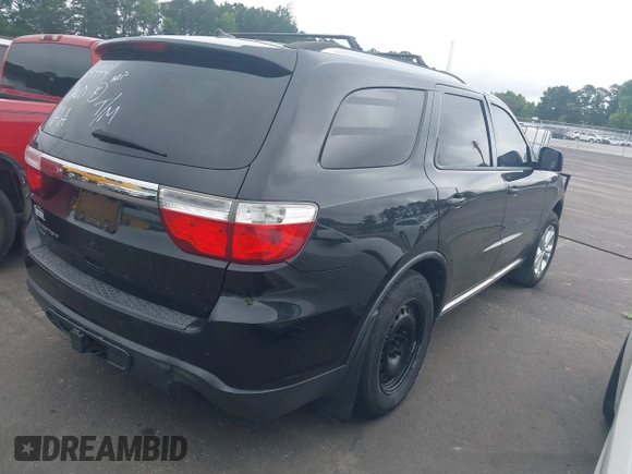 2012 Dodge Durango SXT with VIN 1C4RDJAG4CC314444, listed as a IAAI auction lot 42535630 with 205,494 mi miles and . Bid and sale history available at DreamBid. Image 4.