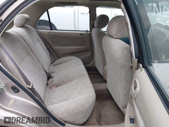 1998 Toyota Corolla VE z VIN 2T1BR18EXWC015480, wystawiony jako IAAI lot #41959316 z przebiegiem 224 304 mil mil oraz . Historia ofert i sprzedaży dostępna na DreamBid. Obrazek 8.
