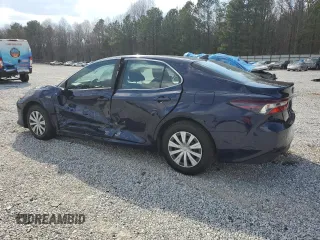 2021 Toyota Camry Hybrid LE with VIN 4T1C31AK9MU557171, listed as a Copart auction lot 48637275 with 77,193 mi miles and Salvage Title. Bid and sale history available at carsss.com. Image 2.