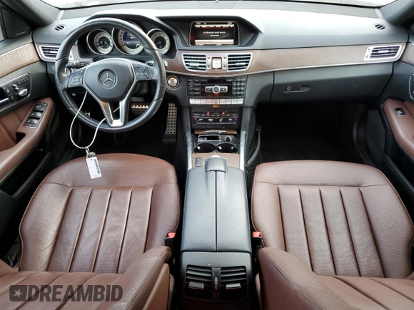 2015 Mercedes-Benz E 350 Luxury with VIN WDDHH8JB0FB134830, listed as a Copart auction lot 70855934 with 106,717 mi miles and Salvage title. Bid and sale history available at DreamBid. Image 8.