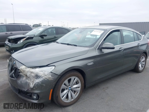 2015 BMW 5 Series 535i Gran Turismo z VIN WBA5M2C5XFD872228, wystawiony jako IAAI lot #42737501 z przebiegiem 71 027 mil mil oraz . Historia ofert i sprzedaży dostępna na DreamBid. Obrazek 17.